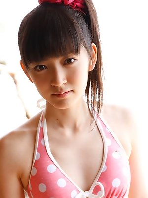 Airi Suzuki Asian in cute bath suit enjoys hot sand on her curves