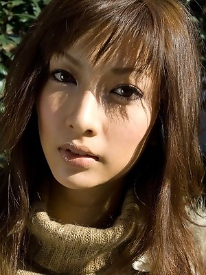 Lovely Reika enjoys stripping and showing off her nice tits and tight pussy